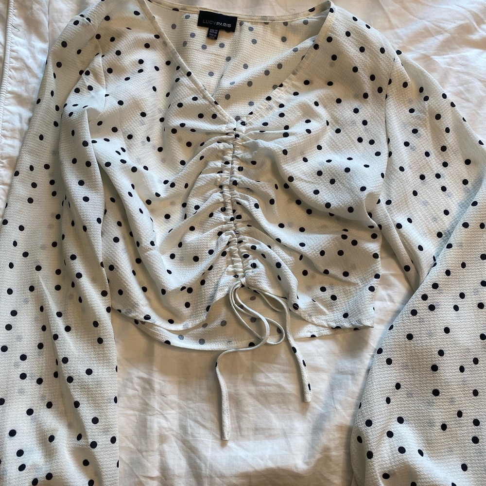 Lucy brand top with syncing by breast